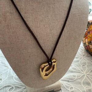 Elegant Gold Sculpture Long Pendant Necklace on Brown Cord